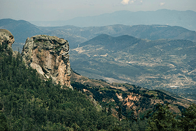 Rocky peaks and a green valley