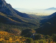 Montezuma Canyon with San Pedro Valley shrouded in haze. Montezuma Canyon with San Pedro Valley shrouded in haze.