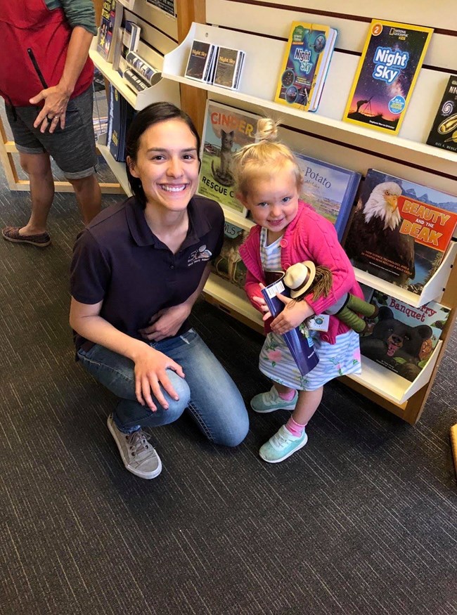 woman with child in bookstore