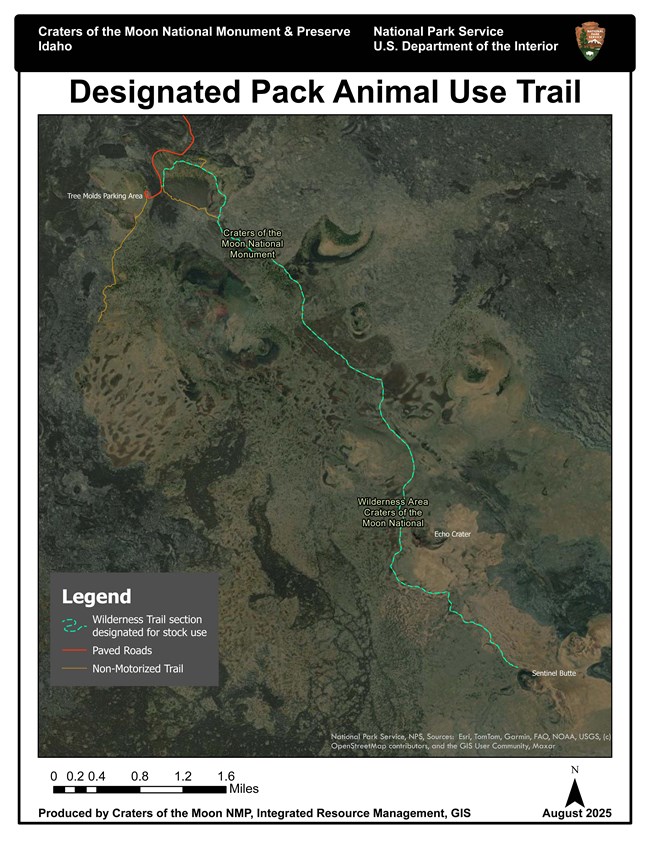 Satellite view map of a portion of Craters of the Moon. The Wilderness trail is highlighted in green, paved roads in red, and non-motorized trails in orange.