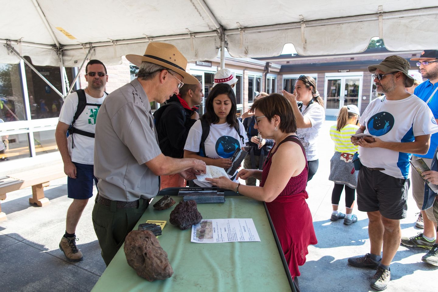Park Ranger at the Information Tent Park Ranger talks to visitors at the Information Tent