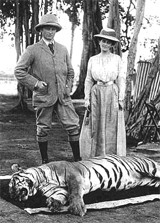 Figure 2: Viceroy and Lady Curzon posing next to a dead tiger.