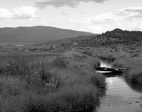 Figure 1: San Luis People's Ditch with mountains in the background.