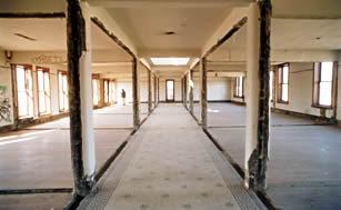 Incompatible Treatment of Floor Plan. The floor plan can be important in defining the character of a historic building. Wholesale demolition or