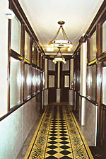 <two photo series> Whether corridors have a high degree of finishes and features (above) or are relatively simple (shown), the existing historic character should be retained. In some instances (shown), it is possible to install soffits to conceal an HVAC system in a corridor so that it is compatible with the historic character. Photos: NPS file