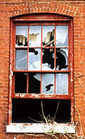 <two photo series> An alternative to scale drawings is a mock-up or sample installation photographed together with an existing window. A mock-up may be particularly helpful in determining the importance of variations between the deteriorated historic window and the proposed replacement window. Photos: NPS files
