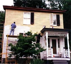 A house in Ellicott City, Maryland, is being primed and painted during rehabilitation for continuing rental residential use. Photo: NPS files