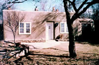 This historic adobe house in Santa Fe, New Mexico, was rehabilitated for rental residential use. Photo: NPS files