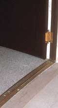 historic threshold made accessible with 1/2-inch wood bevel