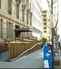 large wood ramp is incompatible with building's historic character