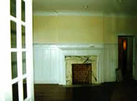 This shows the same dining room with repaired features and new coats of paint.