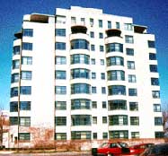 Following this exemplary project to replace the deteriorated windows with matching units, it can be seen that the historic character of the late 1930s apartment building is preserved.