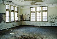 This shows a typical school room prior to rehabilitation for apartment use.