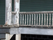 deteriorated porch rail