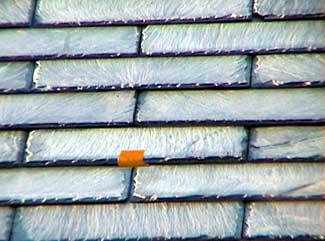 slate shingle roof after repair