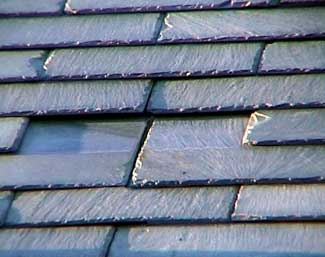 slate shingle roof before repair