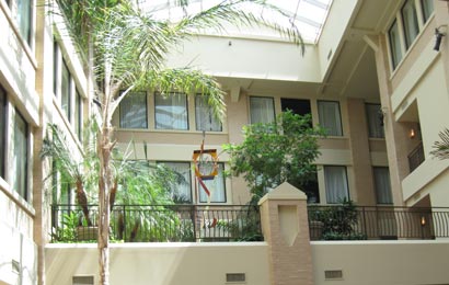 An atrium inserted into a historic building and covered with a skylight.