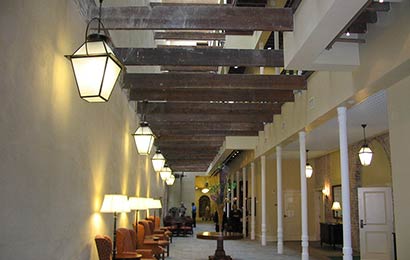 Building framing elements exposed by the insertion of an atrium inserted into a historic building.