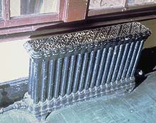 This is an image of a radiator with decorative grillage that should be retained and preserved, as is. Photo: NPS files.
