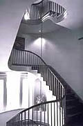 The stairway itself is the second part of this sequence of related spaces, and provides continuing access to the upper floors. This is one example of related spaces, but it does not have to be elegant space. Photo: John Tennant.