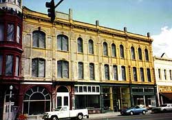 This is an image of the Geiser Grand Hotel storefronts from 1889 and 1930 prior to rehabilitation. Photo: Courtesy, Sidway Investment Corp.