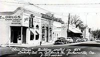 This is an image of California Street, Jacksonville, in the 1930s. Handwriting on the photo notes that the corner drug store was built in 1854. Photo: Courtesy, George Kramer.