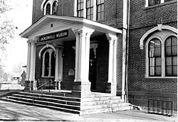 This is an image of the 1946  unadorned, shallow-pitched replacement porch. Photo: George Kramer.