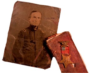 picture of Benjamin Norton, his journal, and a medal earned during the war