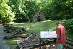 visitor at the historic Iron Furnace