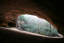 hiker in Sand Cave hiker in Sand Cave