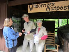 Park volunteers greet park visitor