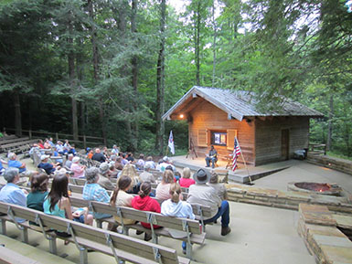 park visitors attending campfire program