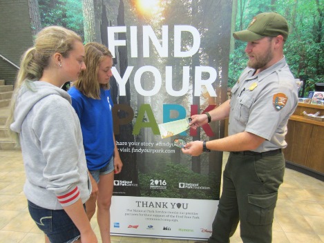 Ranger Jarrod Dotson Shares with Visitors Pentathlon Information