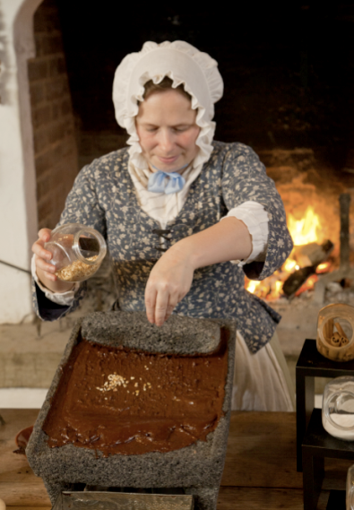 demonstrator making chocolate