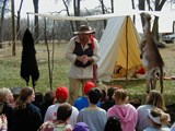 reenactor with students reenactor with students