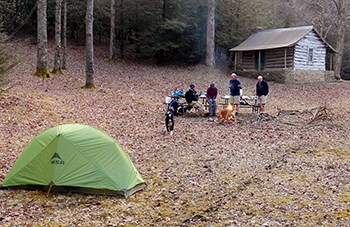 tent and hikers