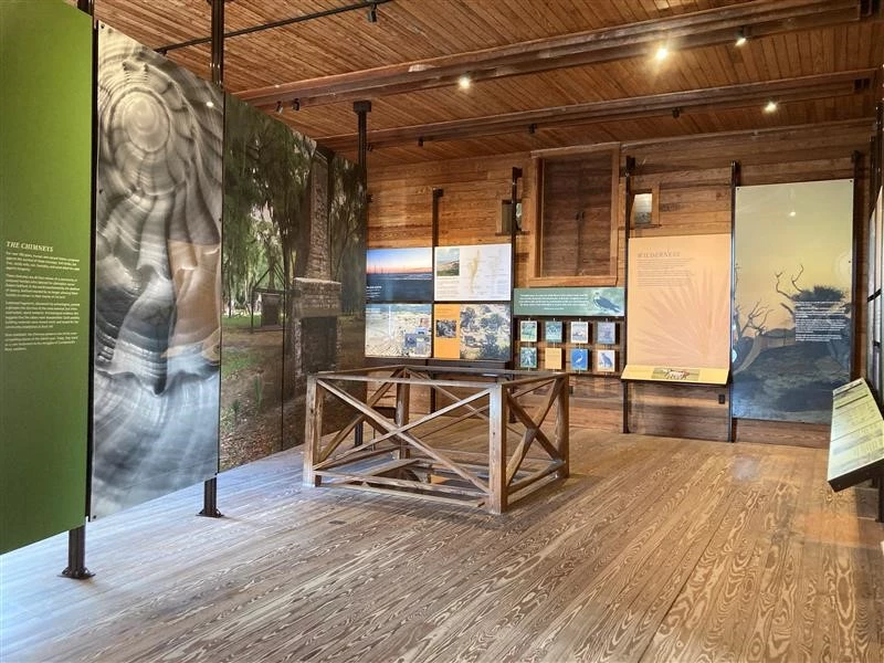 Ice House new exhibits Exhibit panels inside the Ice House Museum showing images of various habitats and wildlife