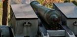 Cannon with large wagon wheels on each side