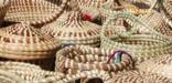 An array of sweetgrass baskets.