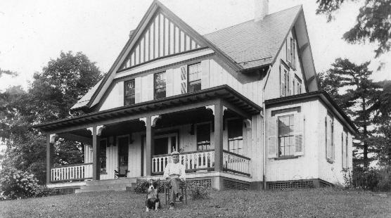 Lawson Waterman in front of his farmhouse.