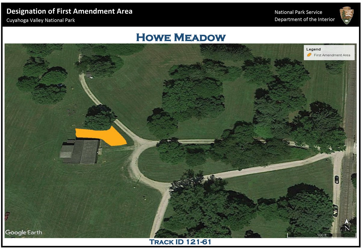 Aerial view of the Howe Meadow area; to the left is the Howe Meadow barn; wrapping around the north side and off to the east of the barn's northeast corner is an irregularly shaped yellow polygon indicating the location of the first amendment area.