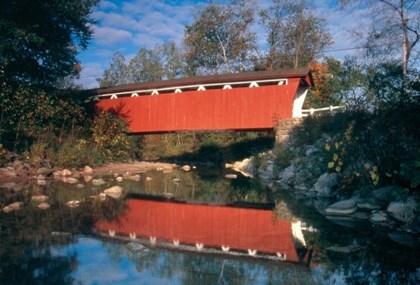 Everett Covered Bridge in summer on a sunny day.  Photo credit: Tom Jones.