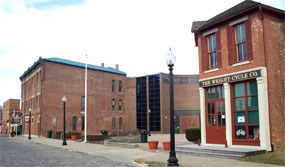 The Wright-Dunbar Interpretive Center with Wright Cycle Company building.