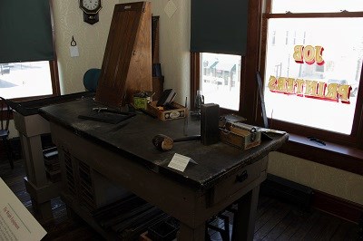 Print shop machinery in a room