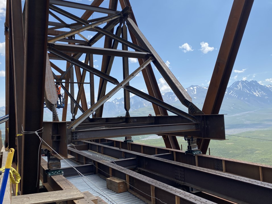 2025-07-05 beginning erection of launch truss FHWA A few bays of a smaller truss sit inside a larger truss.