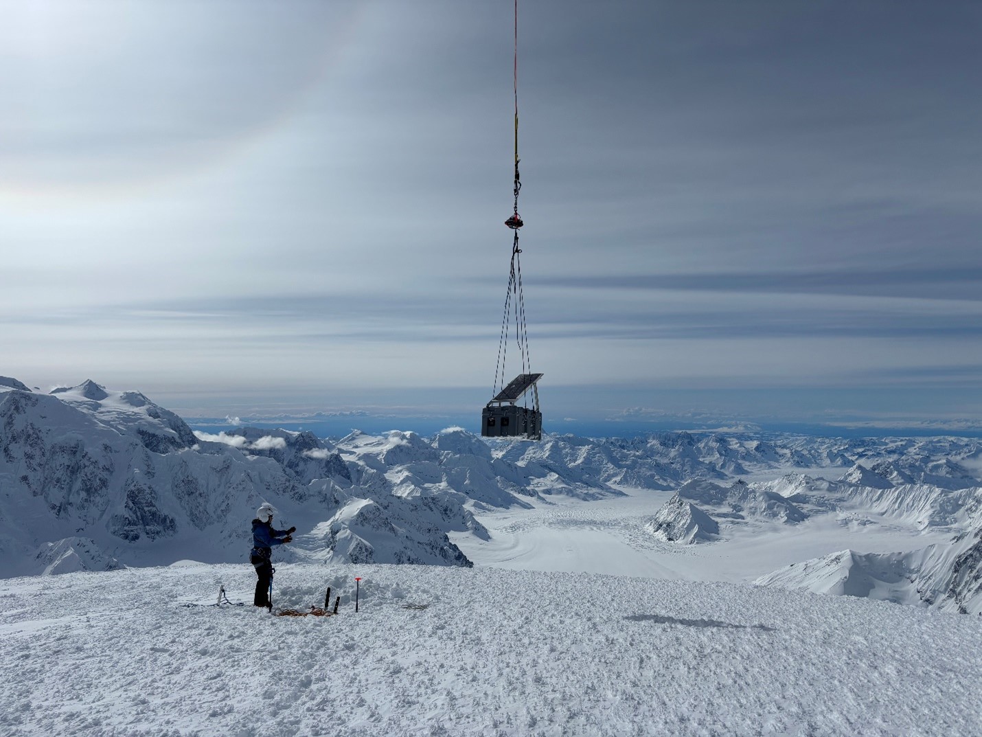 The Crosson repeater The Crosson repeater getting inserted on its lonely perch above the Kahiltna at 12,740’. Mt. Hunter can be seen on the left skyline.