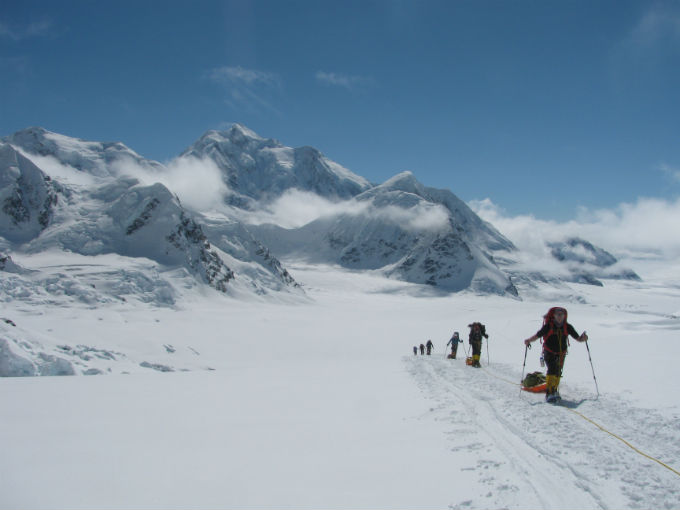 Skiers moving up the glacier at 9,000-feet Skiers moving up the glacier at 9,000-feet