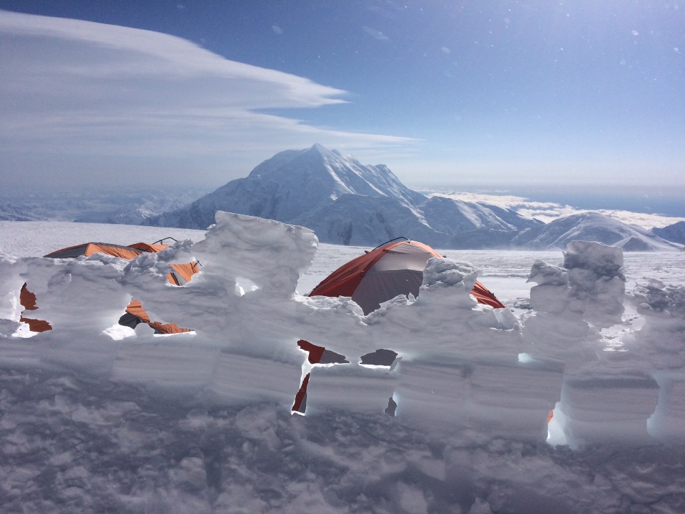 Porous, windblown walls surround tents at the 14,200-camp