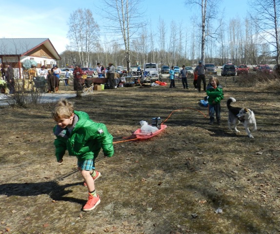 Child pulling sled