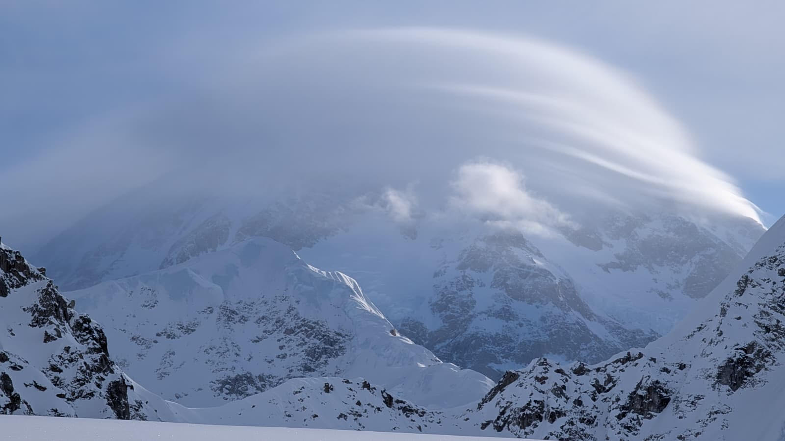 Denali Cloud Cap A lingering lenticular cloud sits atop Mt. McKinley. Photo: K. Ramos-Leon